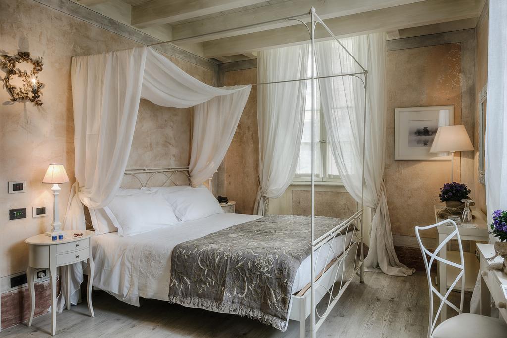 Relais Villa Vittoria ลาโญ ภายนอก รูปภาพ