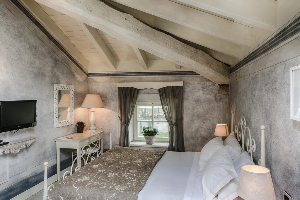 Relais Villa Vittoria ลาโญ ภายนอก รูปภาพ