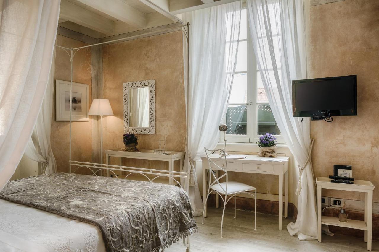 Relais Villa Vittoria ลาโญ ภายนอก รูปภาพ