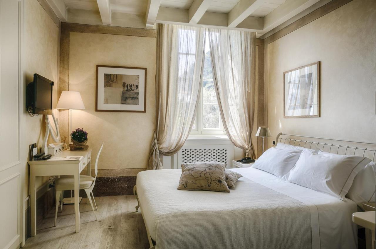 Relais Villa Vittoria ลาโญ ภายนอก รูปภาพ