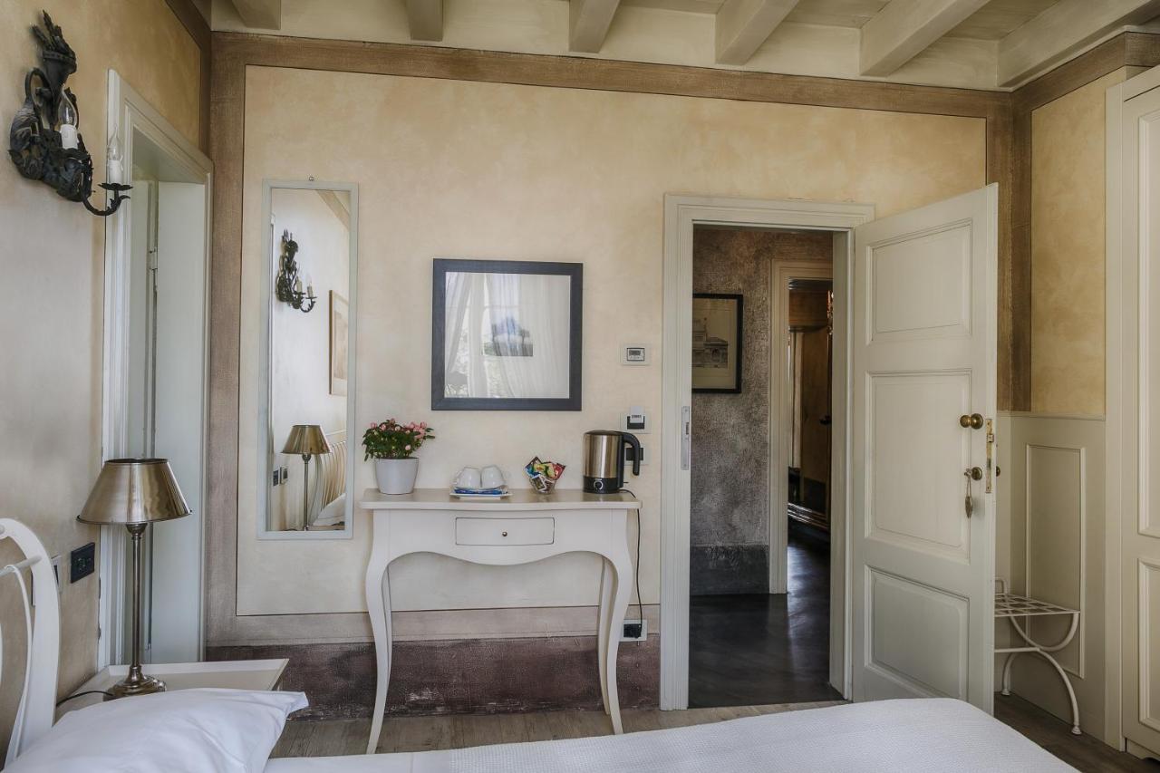 Relais Villa Vittoria ลาโญ ภายนอก รูปภาพ